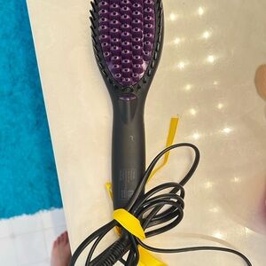 In Styler brand max styling brush New but no box.  Never used